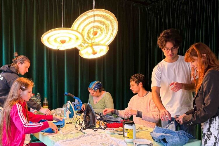 clothing customisation workshop with 5 participants working on their projects